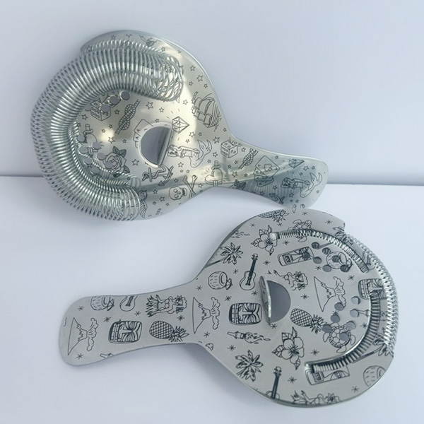 SS cocktail strainer with black etched artwork 